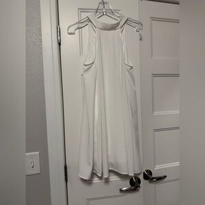 White Sleeveless Swing Dress